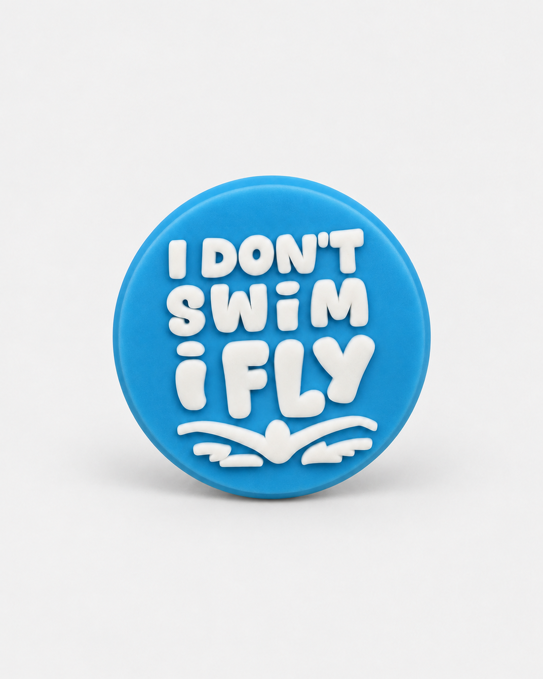 Swim Croc Charm - I don’t swim I fly Blue — studio product photograph